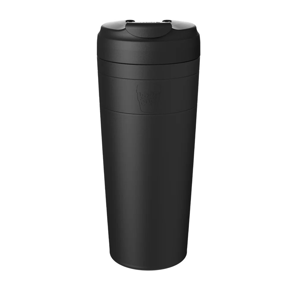 Black KeepCup Commuter XL 20oz cup shown in a front-facing studio shot against a white background, featuring a black finish, flip-top lid, and embossed KeepCup logo on the .