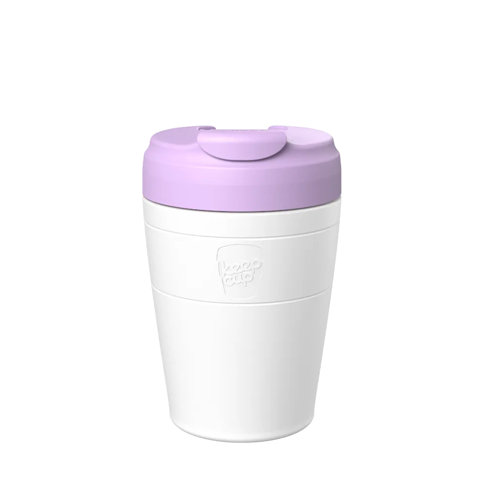 White reusable coffee cup with purple lid and silicone grip band, KeepCup brand logo visible on side