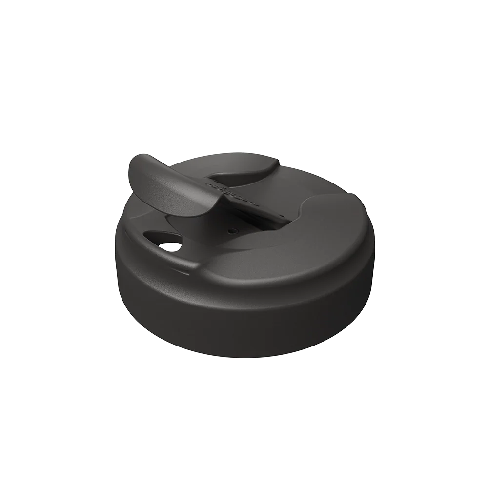 Black KeepCup Commuter Flip Lid shown at an angled view against a white background, displaying the flip-top closure mechanism and drinking spout in the closed position.
