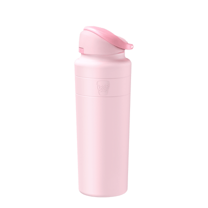 KeepCup Ora Bottle 24oz in Pashmak Pink, shown at a slight angle against a white background, featuring a flip-top lid and the embossed KeepCup logo on the matte pink insulated body.