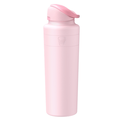 KeepCup Ora Bottle 32oz in Pashmak Pink, shown at a slight angle against a trasperant background. The tall cylindrical stainless steel bottle features a matte pastel pink finish, flip-top lid, and embossed KeepCup logo.