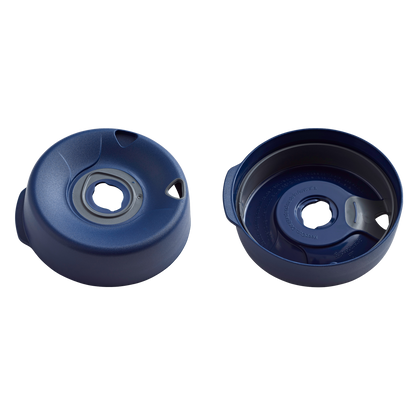 Navy Splashproof Lid Base shown from two angles: the top view displaying the hexagonal centre opening with grey silicone seal and ventilation slots, and the underside view revealing the internal structure and moulded branding text.