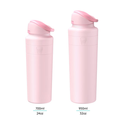 Two KeepCup Ora Bottles in Pashmak Pink shown side by side against a white background, comparing the 700ml (24oz) and 950ml (32oz) sizes, both featuring flip-top lids and the embossed KeepCup logo on the body.