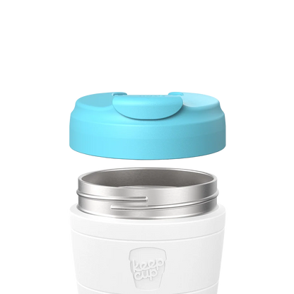KeepCup Commuter Flip Lid in Cloud blue shown separated from a white reusable cup, displaying the stainless steel rim and flip-top closure mechanism in an exploded product view.