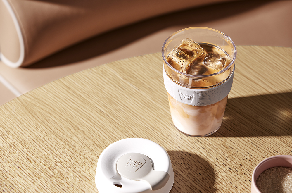 KeepCup with an iced coffee on a table